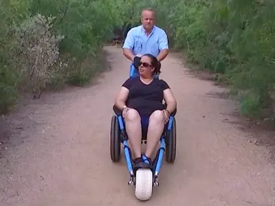 woman in an All-Terrain Wheelchair