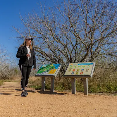 Woman walking at Oso Bay Wetlands Preserve