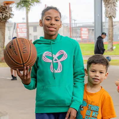 Girl and boy with basketball