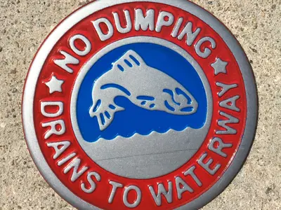 No Dumping Marker, Drains to Waterway