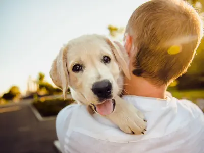 Man holding dog