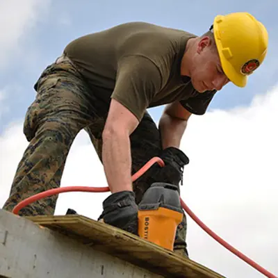 Man working on a roof